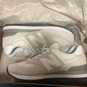 Brand new size 9 New Balance 574 women’s. Nimbus cloud.